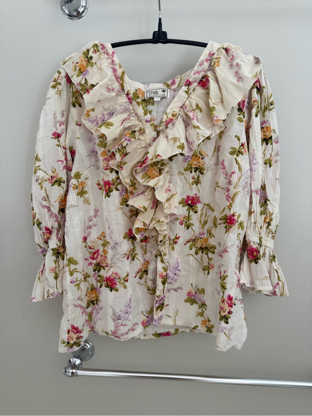 Mille resort and travel Floral Ruffle V-Neck Blouse in Cream and Pink